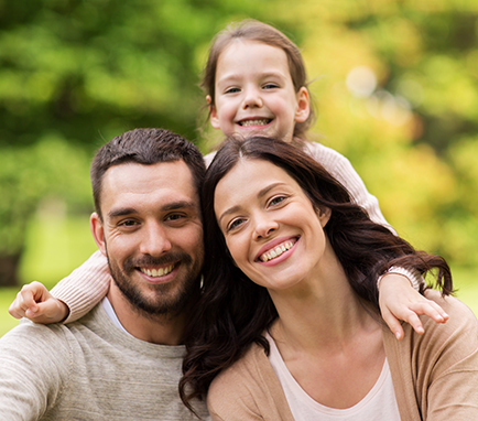 family smiling grand blanc family dental group