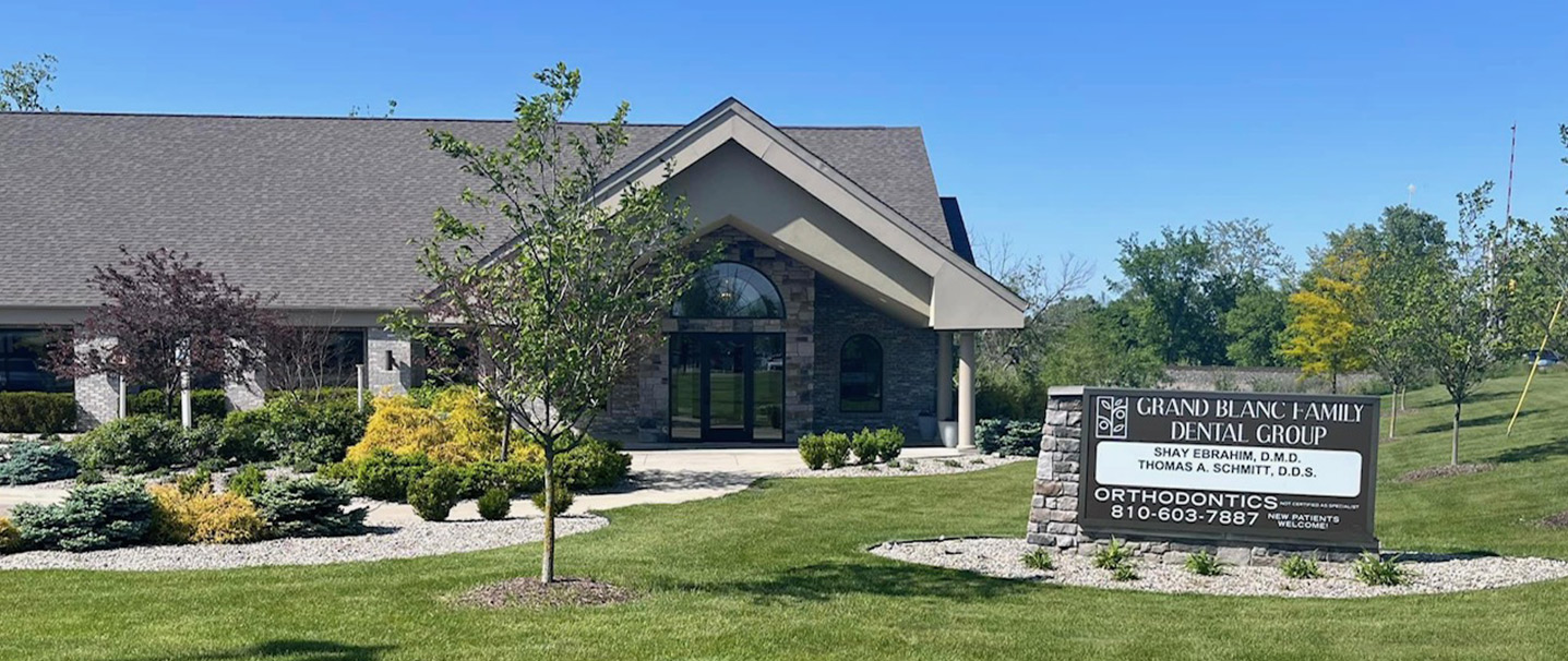 photo of happy family grand blanc family dental group