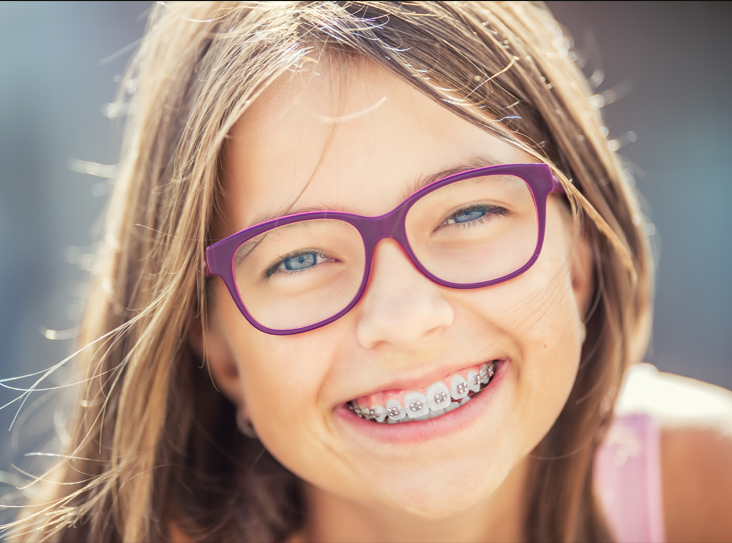 girl smiling with braces